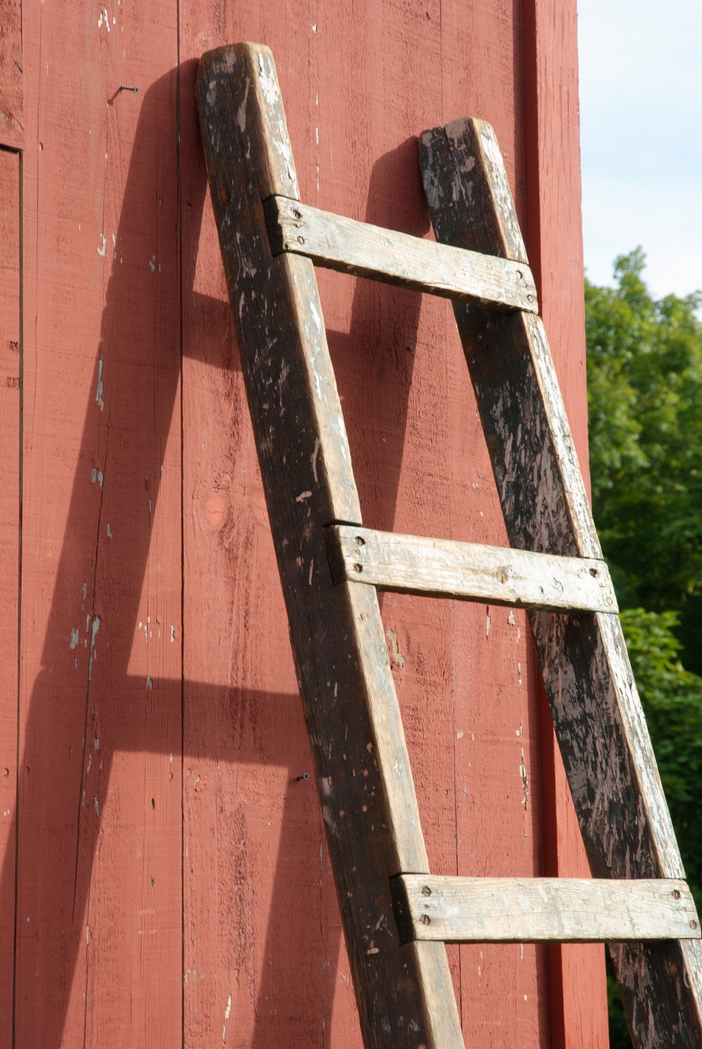 Wooden ladder against wall