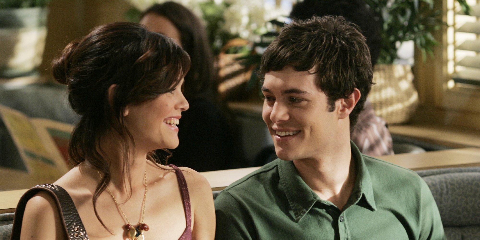 Rachel Bilson as Summer Roberts and Adam Brody as Seth Cohen on The O.C. smiling at each other. Rachel Bilson as Summer Roberts and Adam Brody as Seth Cohen on The O.C. smiling at each other.