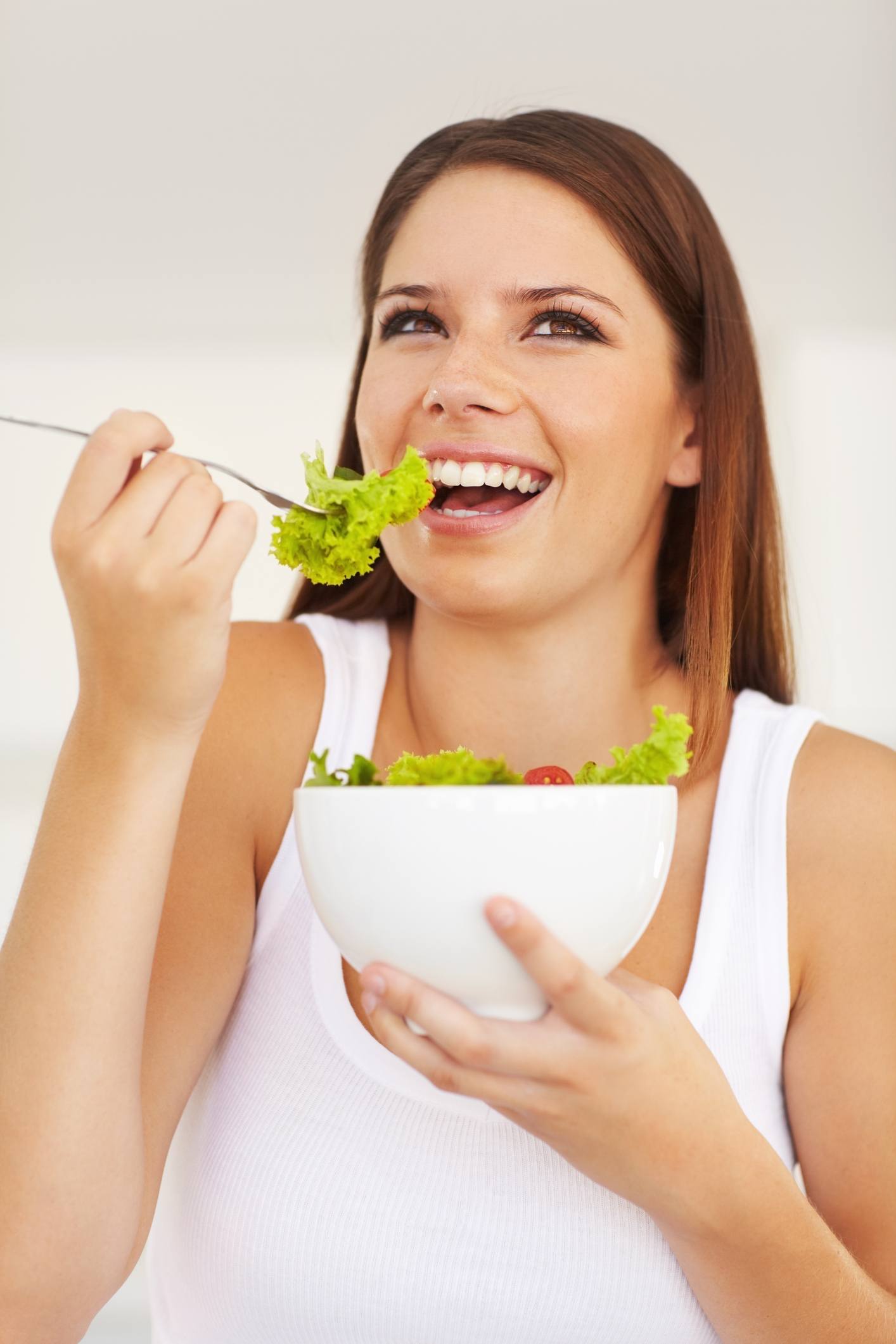 Woman eating a salad