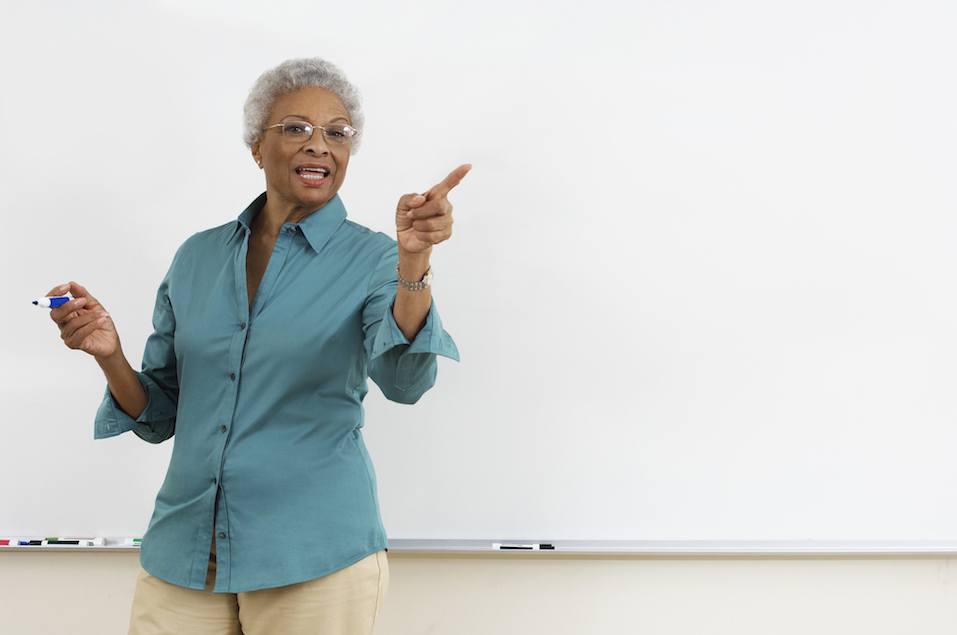 Senior teacher while teaching