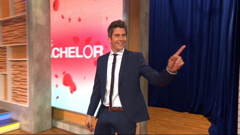 Arie Luyendyk Jr. points his finger while walking out on stage