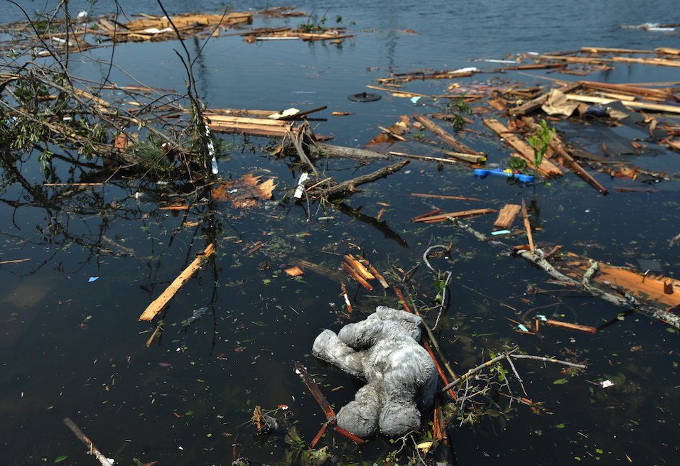 A child's toy floats in the water in the tornado stricken Forest Lake neighbourhood