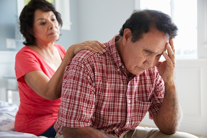 Wife Comforting Senior Husband