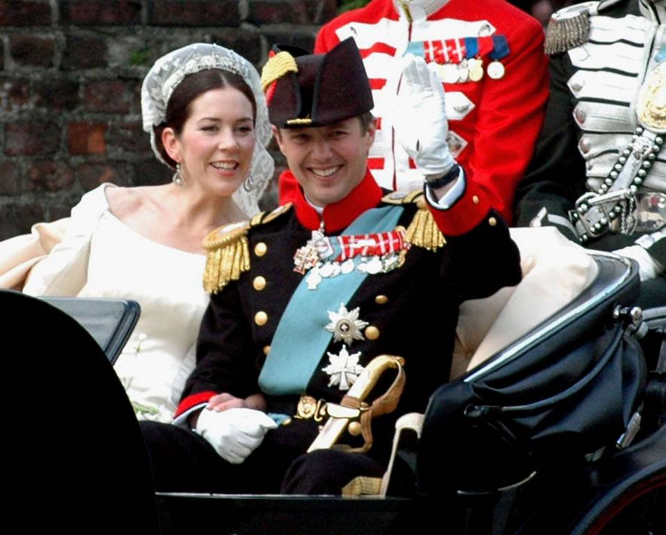 DK Wedding Of Danish Crown Prince Frederik and Mary Donaldson Danish Crown Prince Frederik and his bride Mary wave from their carriage during a procession