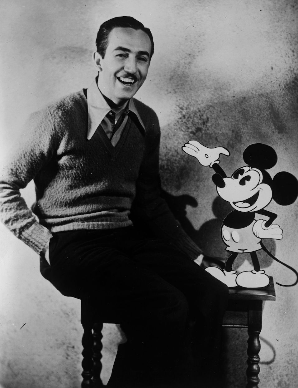 American animator and producer Walt Disney with one of his creations Mickey Mouse