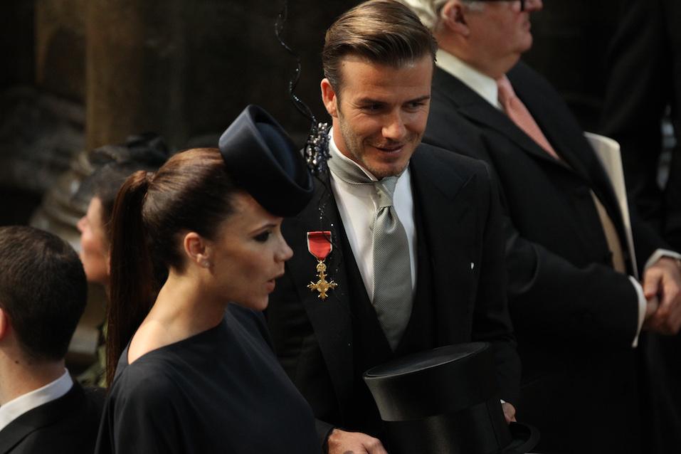 David Beckham and British designer Victoria Beckham attend the wedding service for Britain's Prince William and Kate Middleton