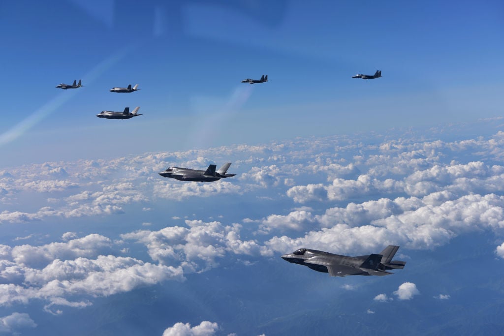 F35 Fighter Jets flying in triangle formation