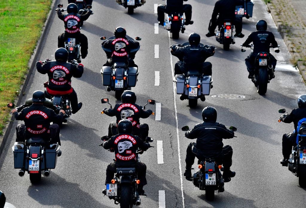 Members of the "Hells Angels" motorcycle club ride their motorbikes