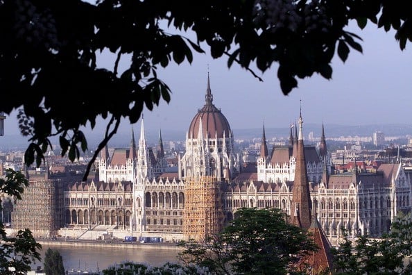 a cathedral in budapest seen through the trees a cathedral in budapest seen through the trees