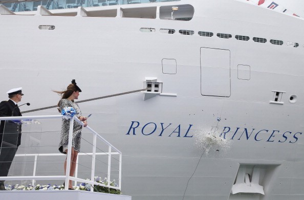 Kate Middleton christens a ship.