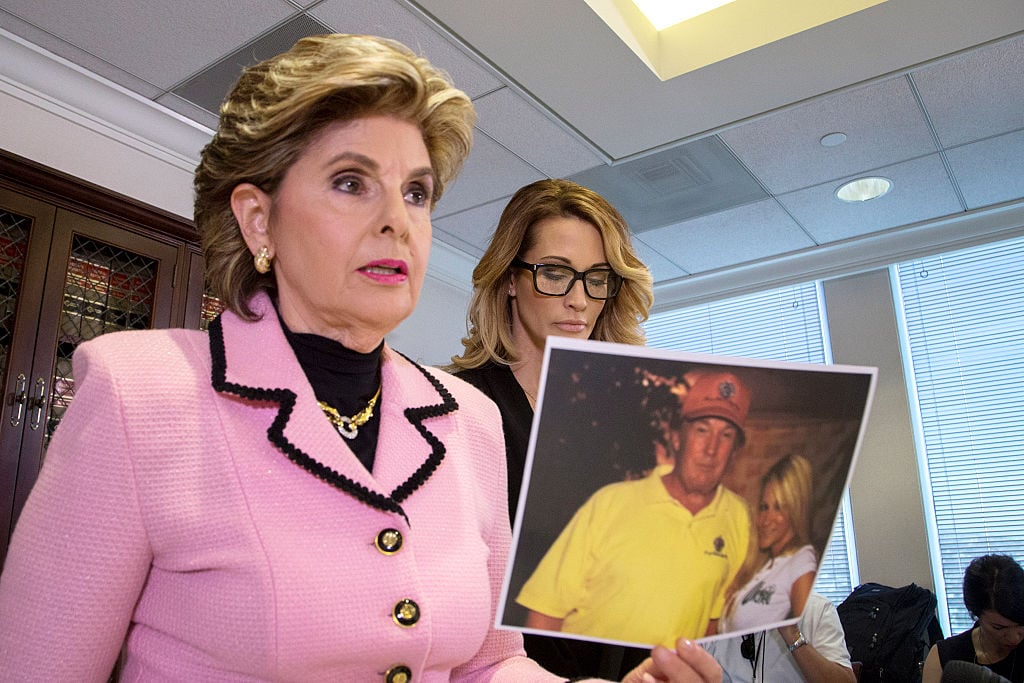 gloria allred holds a photo of jessica drake