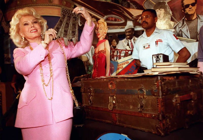 Actress Zsa Zsa Gabor,(L), holds up a beaded purse Actress Zsa Zsa Gabor,(L), holds up a beaded purse