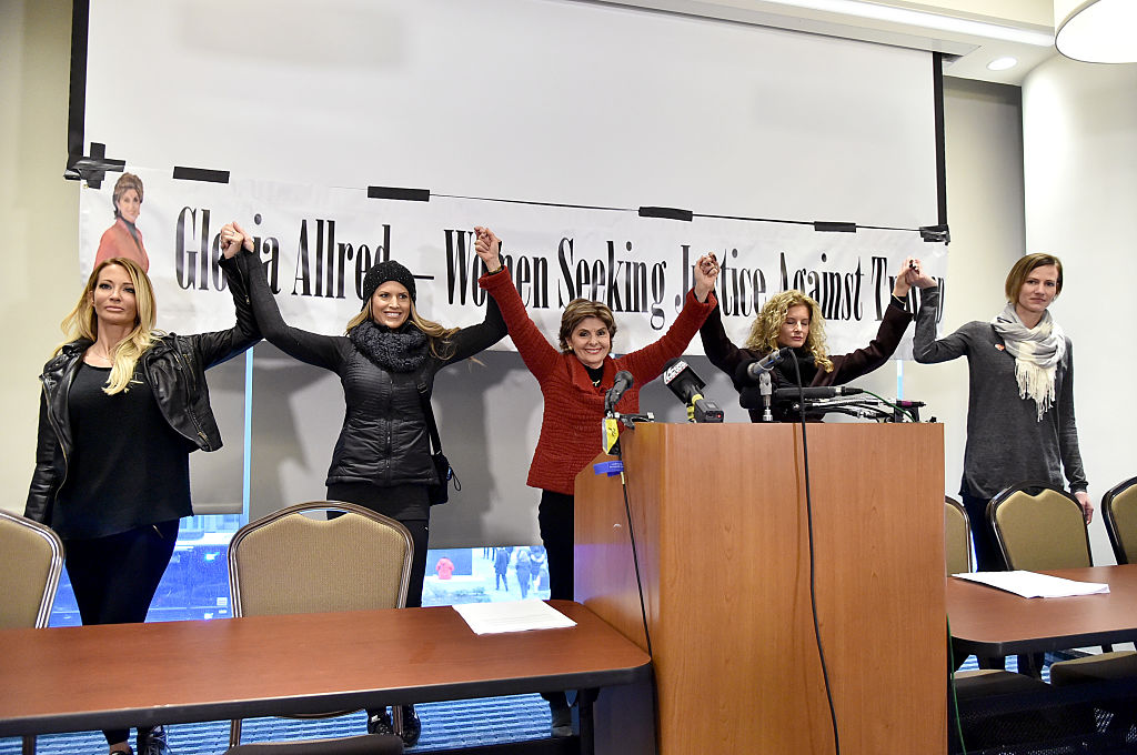 trump accusers join hands in solidarity during a press conference trump accusers join hands in solidarity during a press conference