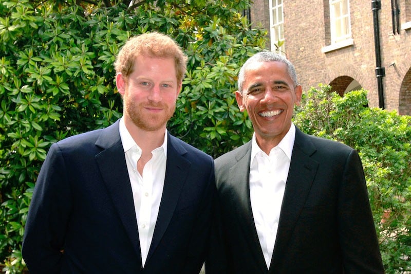 Prince Harry (left) poses with former US President Barack Obama 
