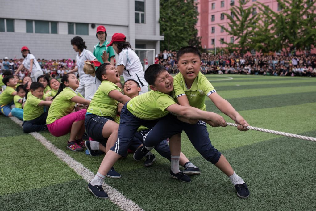 School children take part in a tug-of-war during sports games marking 'Children's Union Foundation day', in Pyongyang.