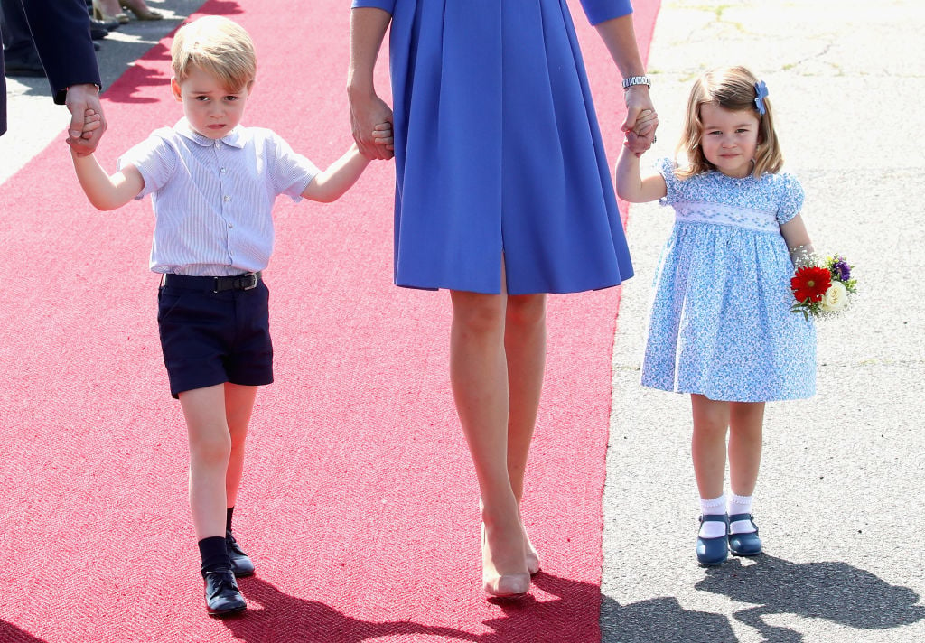 Prince George and Princess Charlotte of Cambridge with Kate Middleton. 