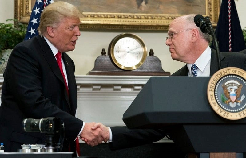 US President Donald Trump shakes hands with Ian Read (R), CEO of Pfizer, during the announcement of a a newly designed, Made in America pharmaceutical glass bottle jointly developed by Merck, Pfizer and Corning during a Made in America Week event in the Roosevelt Room of the White House in Washington, DC, July 20, 2017