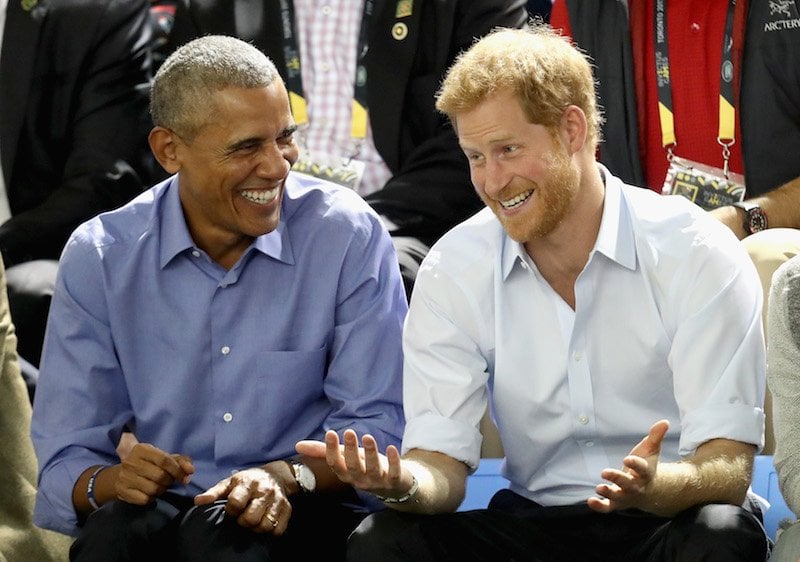 Former U.S. President Barack Obama and Prince Harry share a joke as they watch wheelchair baskeball Former U.S. President Barack Obama and Prince Harry share a joke as they watch wheelchair baskeball
