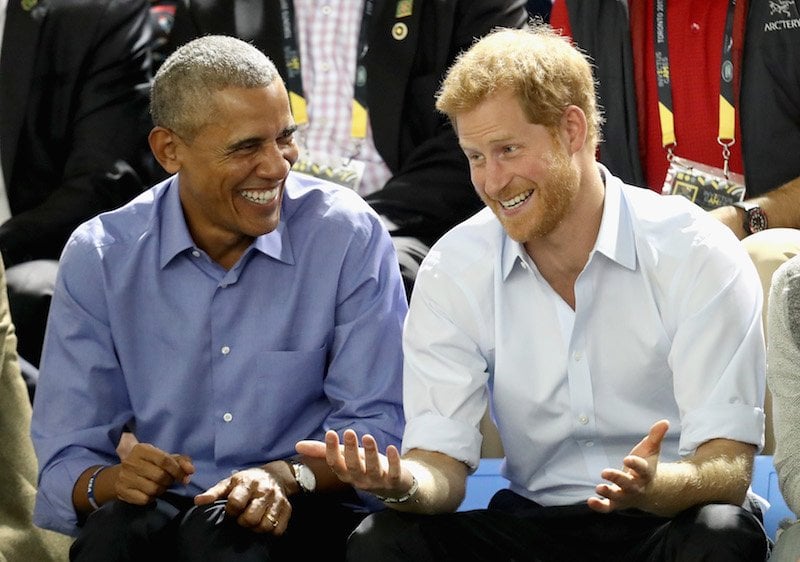  Former U.S. President Barack Obama and Prince Harry share a joke as they watch wheelchair baskeball