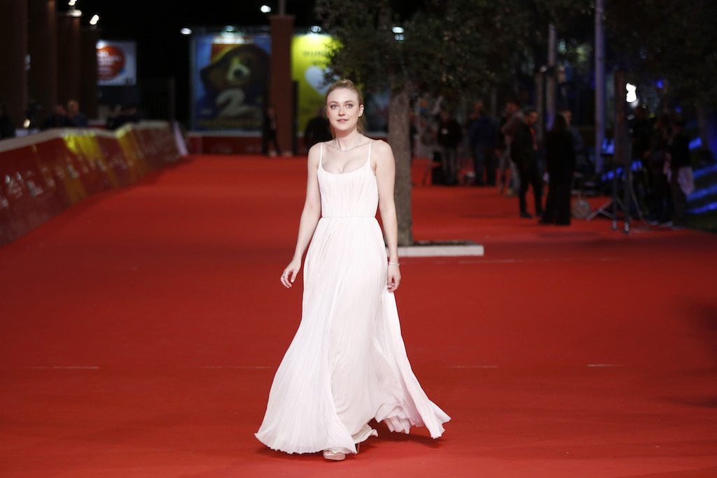 Dakota Fanning walks a red carpet for 'Please Stand By' during the 12th Rome Film Fest