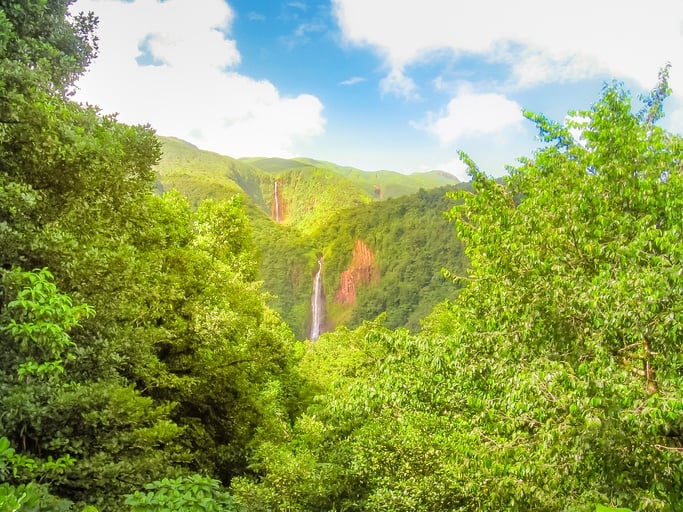 Scenic landscape in tropical rainforest of Carbet Falls or Les Chutes du Carbet, on Carbet River, Guadeloupe island, Caribbean, French Antilles