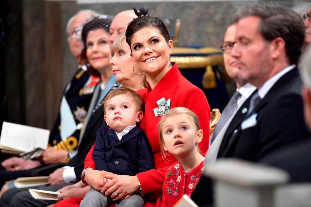 (L-R) King Carl Gustaf of Sweden, Queen Silvia, Erik Hellqvist, Marie Hellqvist, Crown princess Victoria with Prince Oscar, Prince Daniel and Mr Christopher O'Neill