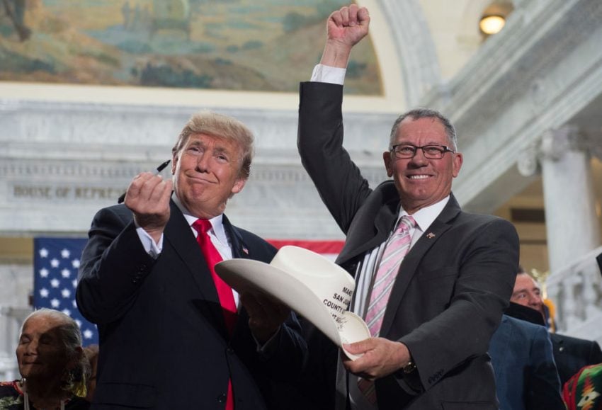 Trump being a douchebag with a pen, a cowboy hat, and a puppet