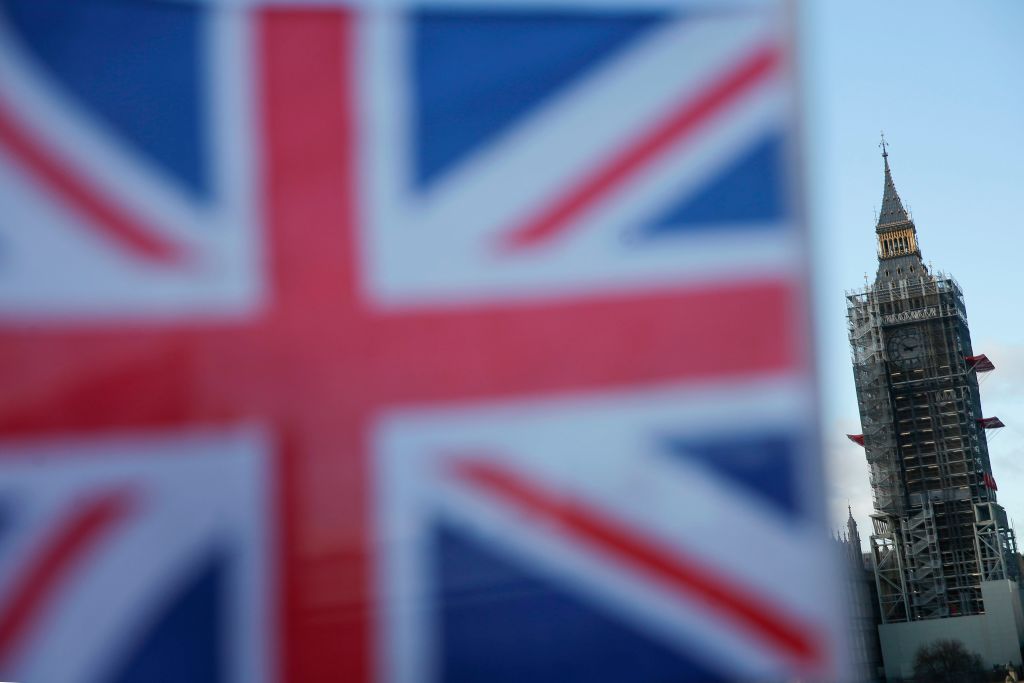 A Union Flag is seen with Elizabeth Tower (Big Ben)