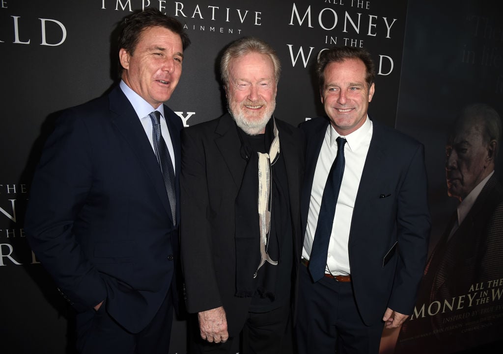 Ridley Scott (center) with producers Dan Friedkin (left) and Bradley Thomas (right) at the premiere of All The Money In The World" on December 18, 2017.
