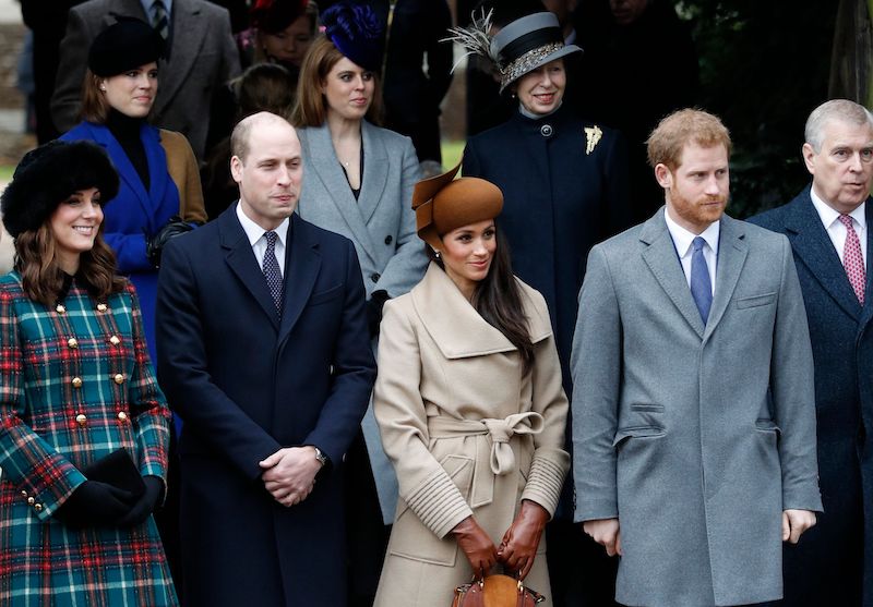 Britain's Catherine, Duchess of Cambridge, (L) and Britain's Prince William, Duke of Cambridge, (2L), US actress and fiancee of Britain's Prince Harry Meghan Markle (2R) and Britain's Prince Harry (R) stand together as they wait to see off Britain's Queen Elizabeth II after attending the Royal Family's traditional Christmas Day church service at St Mary Magdalene Church in Sandringham, Norfolk, eastern England, on December 25, 2017.