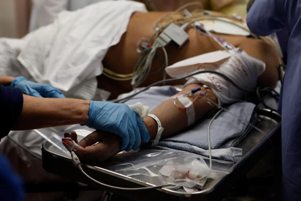 a man in an emergency room a man in an emergency room