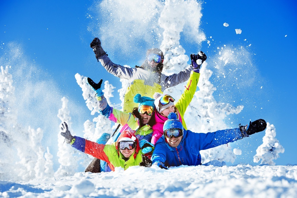 Friends having fun in snow Friends having fun at Sheregesh ski resort