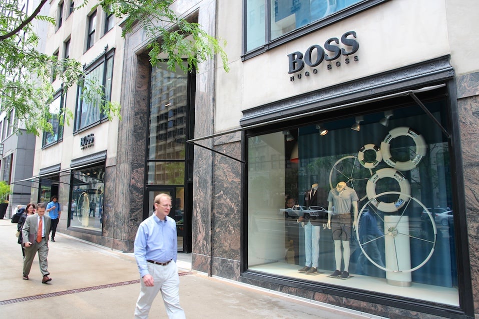 Hugo Boss store eople walk past Hugo Boss store at Magnificent Mile