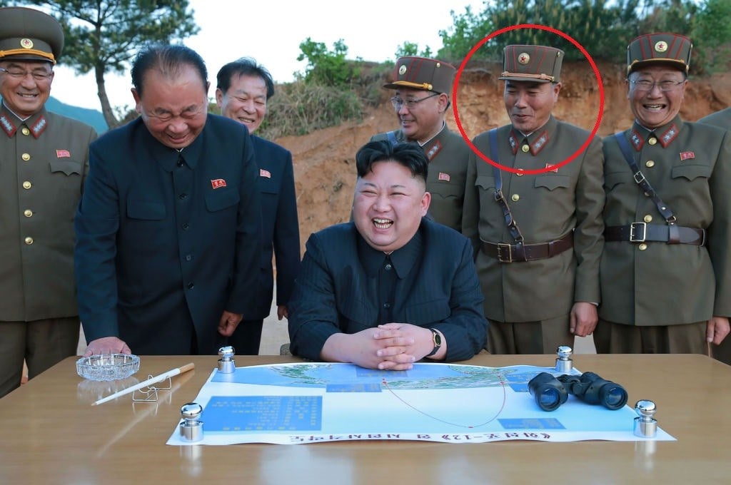 North Korean officials with Jang Chang- Ha circled