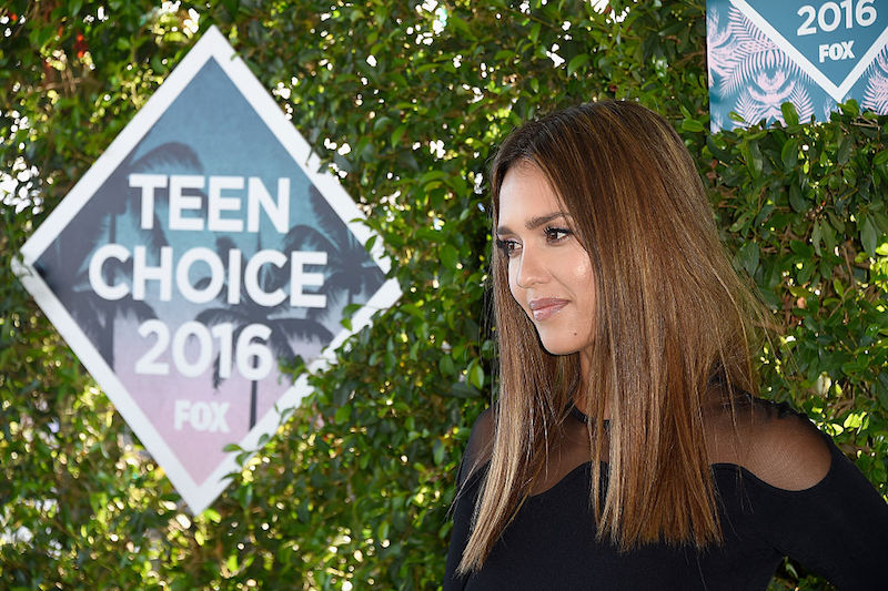 Jessica Alba poses in a black dress. Jessica Alba poses in a black dress.