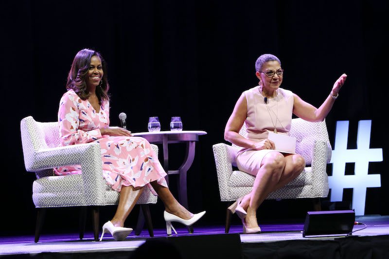 Former First Lady Michelle Obama speaks, emphasizing that women must celebrate their strength, during a live conversation with The Women's Foundation of Colorado President and CEO Lauren Y. Casteel at Pepsi Center on July 25, 2017 in Denver, Colorado. 