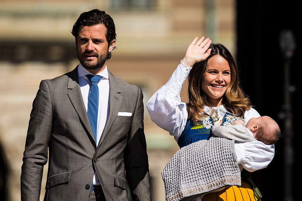 Prince Carl Phillip, Princess Sofia, and Prince Alexander of Sweden participate in a ceremony celebrating Sweden's national day
