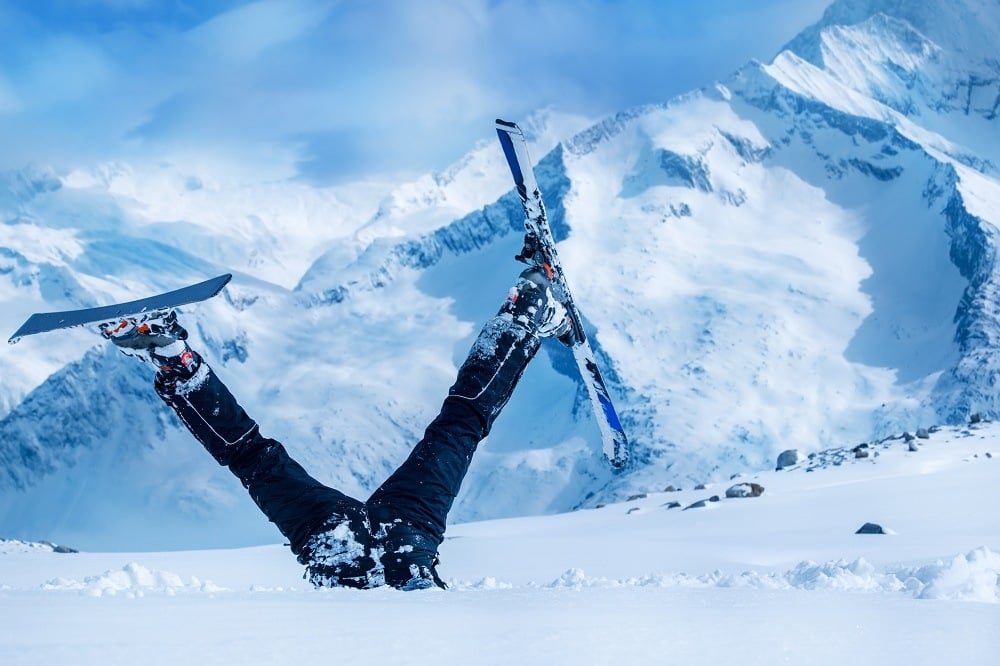 Newbie skier stuck in deep snow