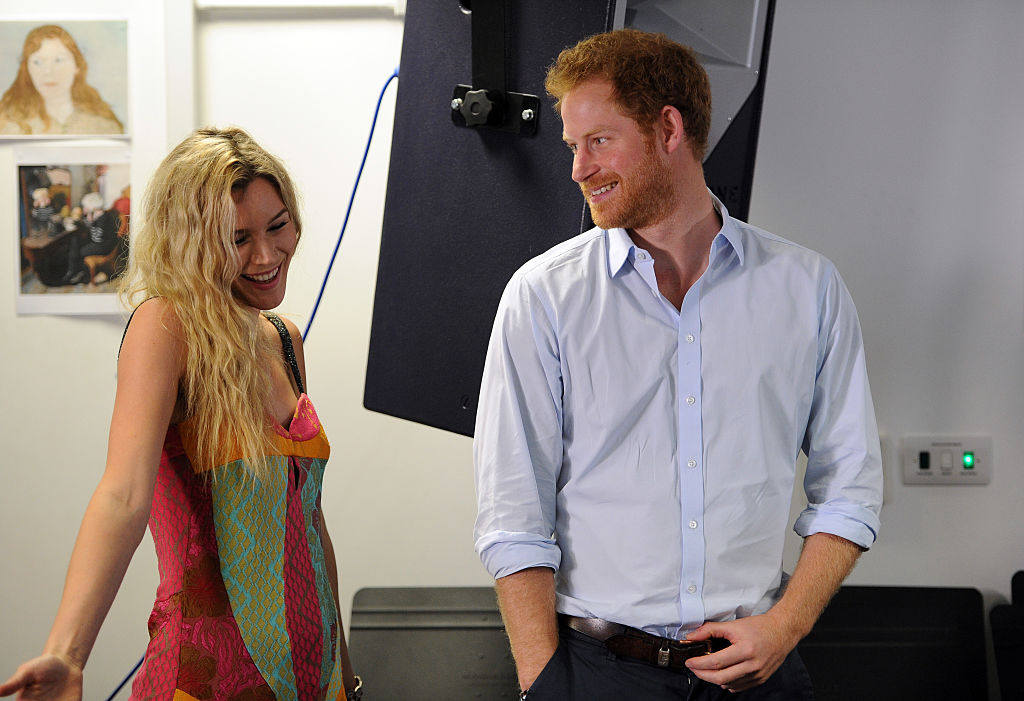 Joss Stone and Prince Harry watch members of the Basotho Youth Choir during their rehearsals at the Brit School