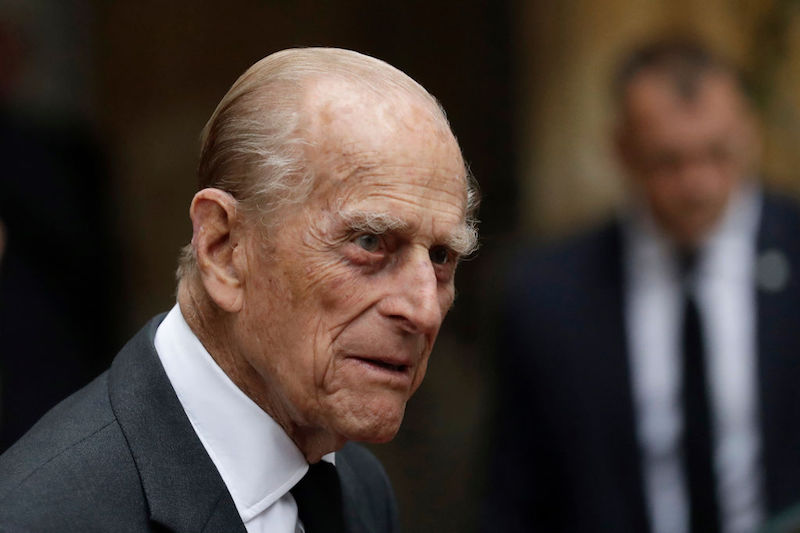 Prince Phillip in a grey suit and tie. Prince Phillip in a grey suit and tie.