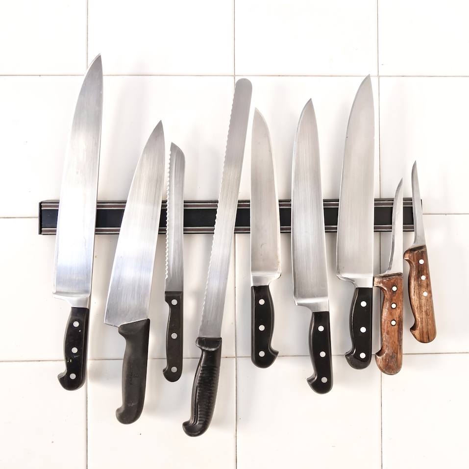 Set of knives on magnetic holder