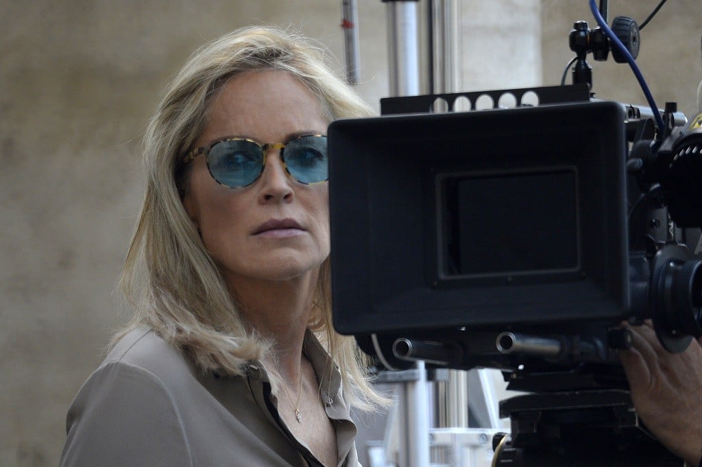 US actress Sharon Stone stands on the set on the first day of the shooting of "Un ragazzo d'oro" (A golden boy) at a church on Piazza del Popolo on July18, 2013 in Rome. "Un ragazzo d'oro" (A golden boy) Sharon Stone, Riccardo Scamarcio, Cristiana Capotondi, Giovanna Ralli is directed by Italian filmmaker Pupi Avanti. AFP PHOTO / ANDREAS SOLARO (Photo credit should read ANDREAS SOLARO/AFP/Getty Images)