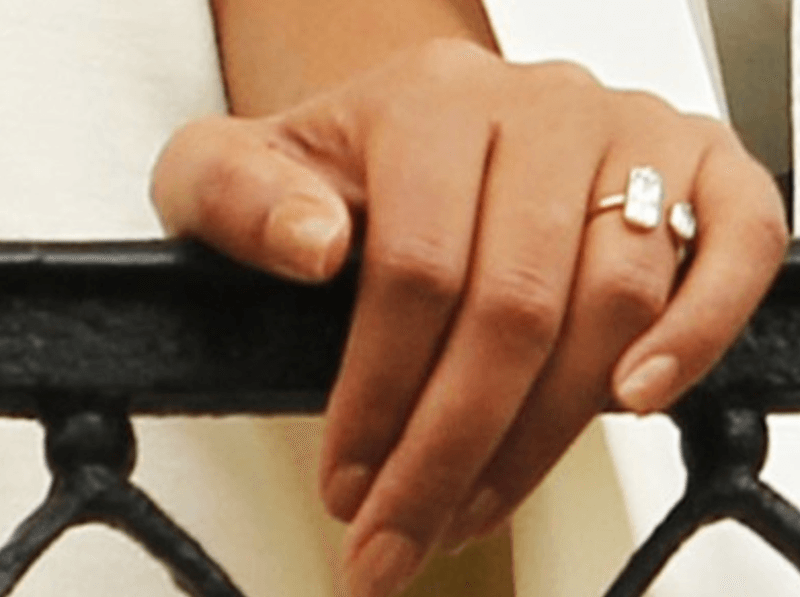 Solange Knowles' diamond engagement ring on her hand as she leans over a balcony rail. Solange Knowles' diamond engagement ring on her hand as she leans over a balcony rail.