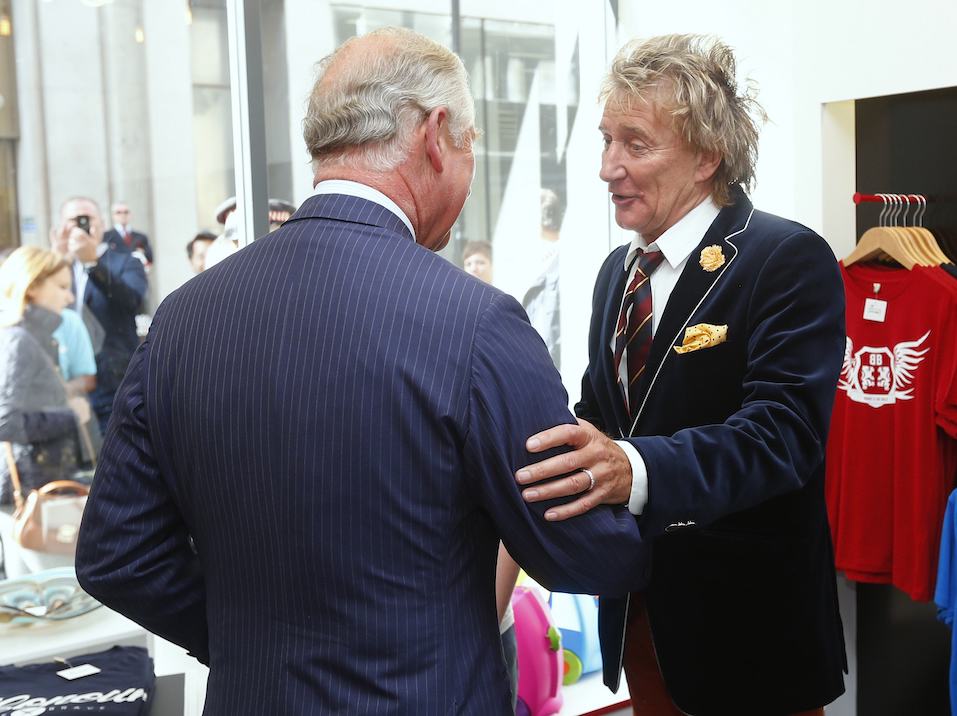Rod Stewart and Prince Charles Rod Stewart (R) apologises to Prince Charles, Prince of Wales after arriving late for the opening of The Prince's trust 'Tomorrow's Shop'