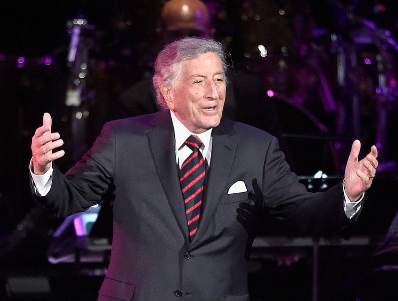 Tony Bennet on stage performing. 