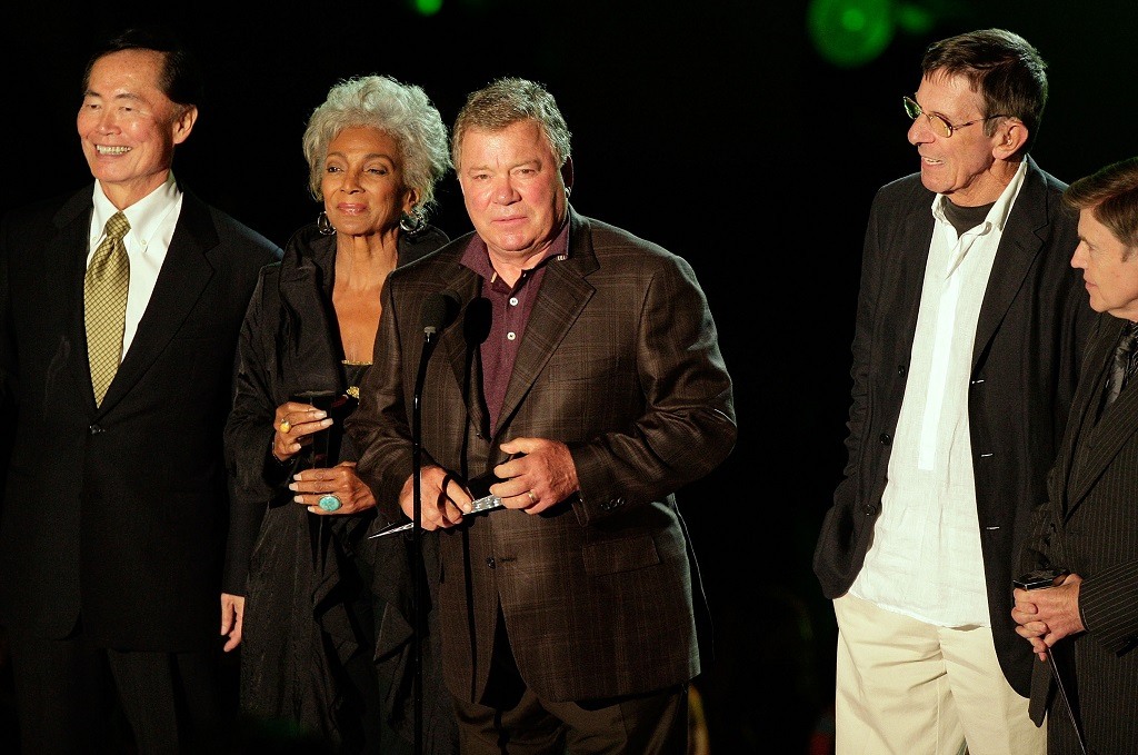 Actors George Takei, Nichelle Nichols, William Shatner, Leonard Nimoy and Walter Koenig accept an award.