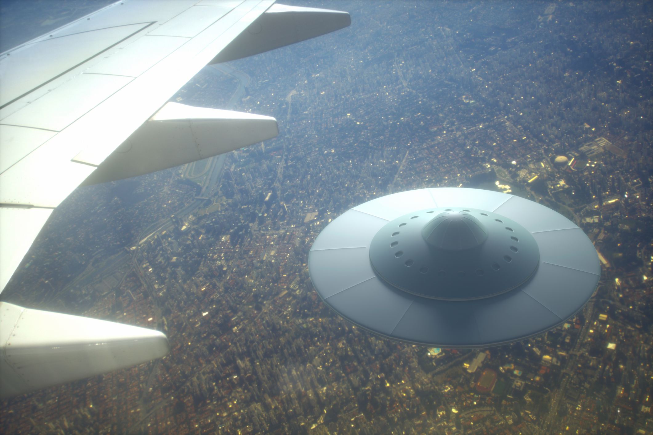 UFO flying below plane's wing