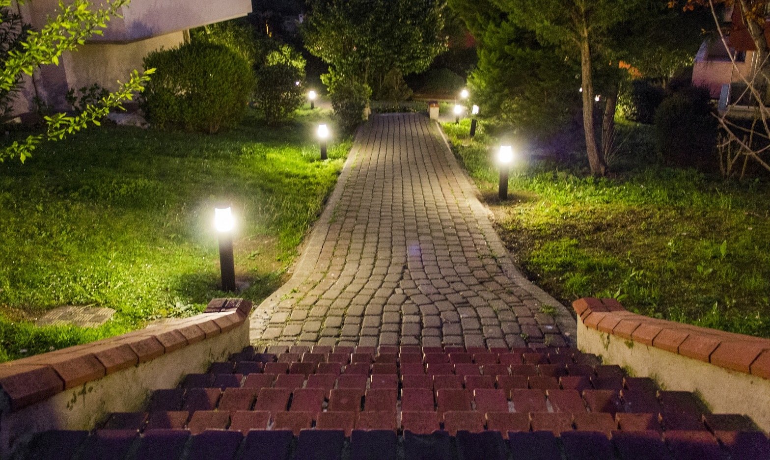 House and garden at night