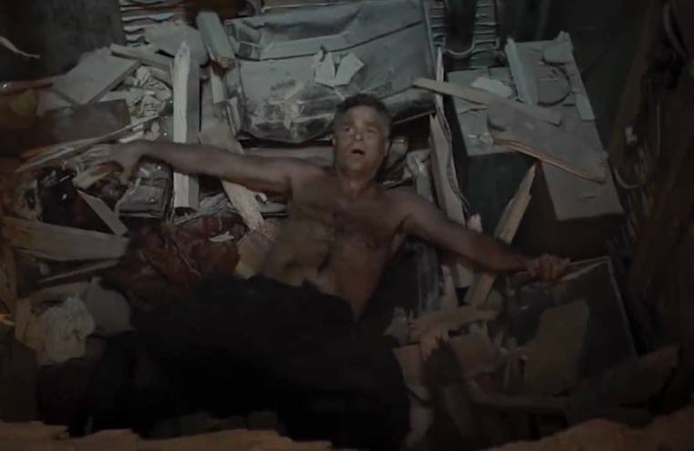 Bruce Banner lays in a pile of debris Bruce Banner lays in a pile of debris