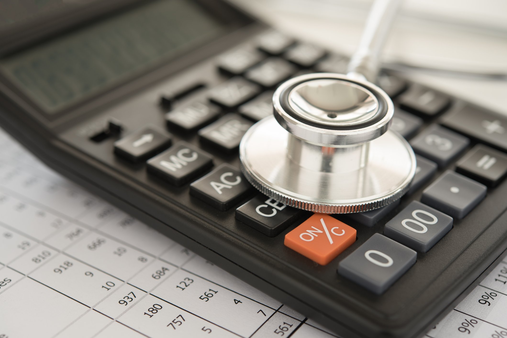 Health care costs concept with calculator